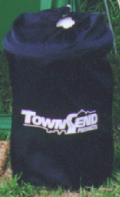 Picture showing that Townsend portable bathroom when packed is the size of a sleeping bag.